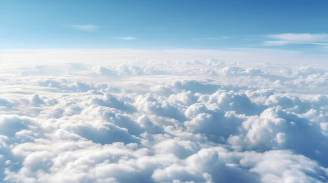Beautiful aerial view above clouds with blue sky.Concept of air pollution and greenhouse effect. © Emmy Ljs