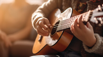 Fototapeta premium Little boy plays the guitar at home.Created with Generative AI technology.