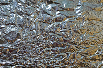 Close up of crumpled aluminum foil or tinfoil. Meant as background
