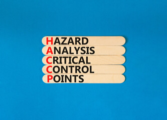 HACCP symbol. Concept words HACCP hazard analysis critical control point on wooden stick. Beautiful...