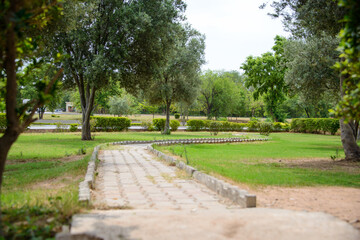 A pathway leads through the park from a rest area on the motorway from Lahore to Islamabad.