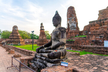 Buddha statue at the ancient temple of Wat Maha That in Ayutthaya