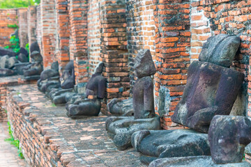 Headless Buddha at Wat Maha That temple, A UNESCO World Heritage site in Ayutthaya. Ancient...
