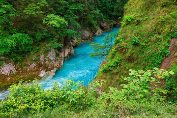 Summer scenic view of Tolmin Gorges. Majestic scenery with clean mountain river in the deep gorges of Tolmin, Slovenia, Europe	