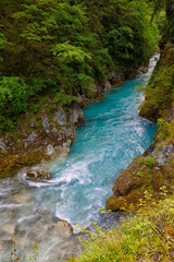 Beautiful landscape of Tolmin Gorges. Majestic scenery with clean mountain river in the deep gorges of Tolmin, Slovenia, Europe