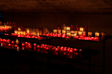 burning candles in a crypt in Saint Marie de la Mer