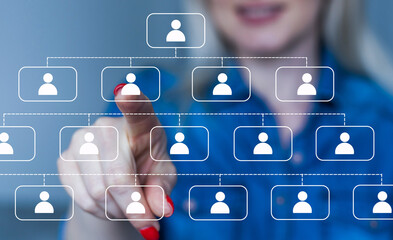 Businesswoman touching virtual network icons at home office
