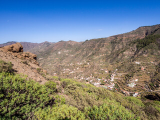 Walking from Roque Nublo to Tejeda on the island of Gran Canaria, Canary Islands, Spain - 613949284