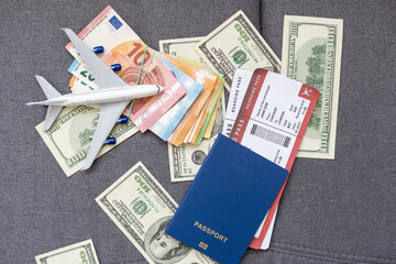 travel during the covid-19 pandemic. airplane model with face mask and travel documents