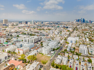 Los Angeles, California - June 13, 2023: aerial drone view toward LA downtown buildings above...