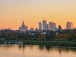 Fototapeta na wymiar View over River Vistula towards City Centre Skyline at sunset, Warsaw, Masovian Voivodeship, Poland