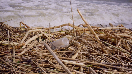 Plastic and other drifting debris has reached Black Sea beaches in Odessa, Ukraine. Environmental disaster caused by the explosion of Kakhovka Hydroelectric Power Plant dam, Close-up