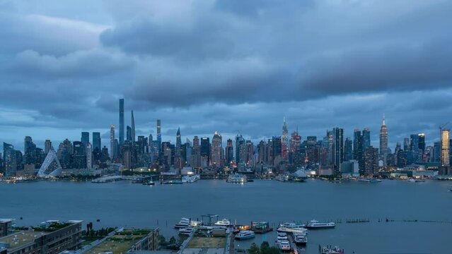 NYC cityscape - Full Moon Rising Behind Skyline - Time Lapse