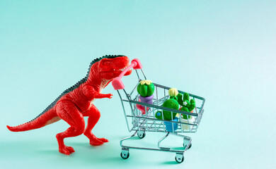 Red dinosaur with shopping cart full of cactuses on blue background.