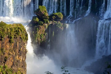 Famous Iguazu or Iguacu Falls National Park Argentina.  Scenic Falling Water Cascades Lush Tropical Rainforest, Devils Throat Landscape Viewpoint