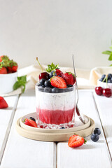 Chia pudding with berries, healthy breakfast.