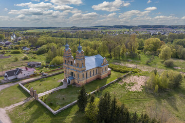 aerial view on neo gothic or baroque temple or catholic church in countryside