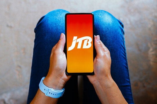 June 16, 2023, Brazil. In this photo illustration, the JTB Corporation logo is displayed on a smartphone screen.