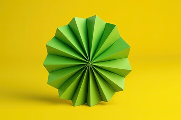 green paper pinwheel on a yellow background