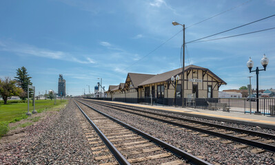 Fototapeta na wymiar Train tracks and railway station at Cut Bank, Montana, USA