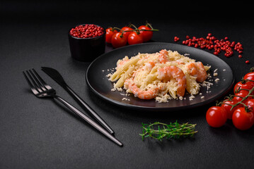 Delicious fresh penna pasta with shrimp, sauce, cheese, salt and spices
