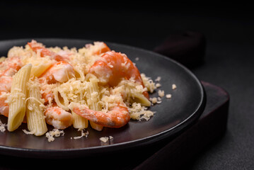 Delicious fresh penna pasta with shrimp, sauce, cheese, salt and spices
