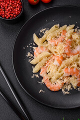 Delicious fresh penna pasta with shrimp, sauce, cheese, salt and spices