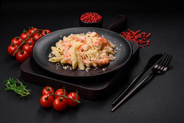 Delicious fresh penna pasta with shrimp, sauce, cheese, salt and spices