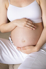 Fototapeta na wymiar pregnant woman hold hands stomach concept pregnancy motherhood preparation expectation