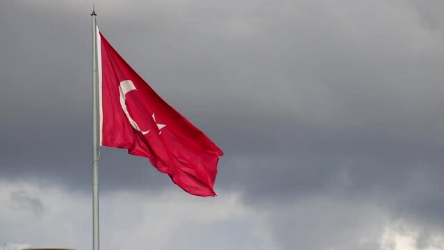A Shot of a Turkish Flag Waving Against Cloudy Sky.for Turkish national holidays