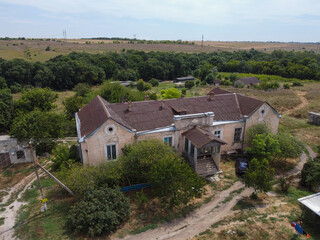 Fototapeta na wymiar Rural house by the forest in Ukraine. 