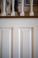 Detail of a White Wall with Columns.