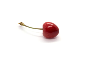Red berry of a cherry tree on a white background