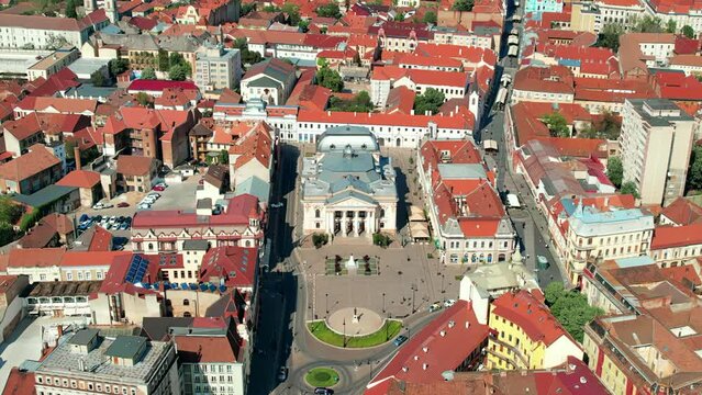 Aerial drone view of Oradea downtown, Romania. State Theatre with square in front of it and historical buildings around