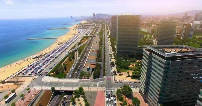 Barcelona, Spain: Aerial view of capital city of Catalonia, modern part of city with high-rise buildings. Modern high-rise buildings in the coastal residential areas of Diagonal Mar and Poblenou. 