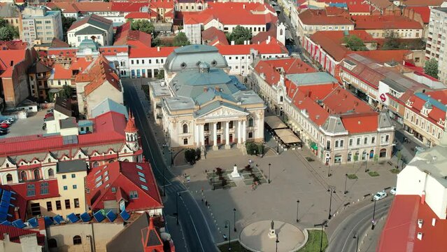 Aerial drone view of Oradea downtown, Romania. State Theatre with square in front of it and historical buildings around