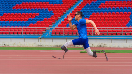 Willful Asian athlete speeds up on stadium track, aiming to break his record with prosthetic blades