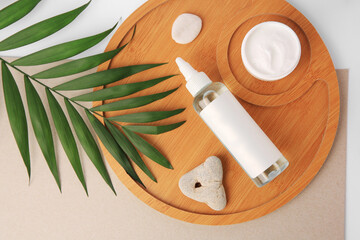 Flat lay composition with cosmetic products on color background