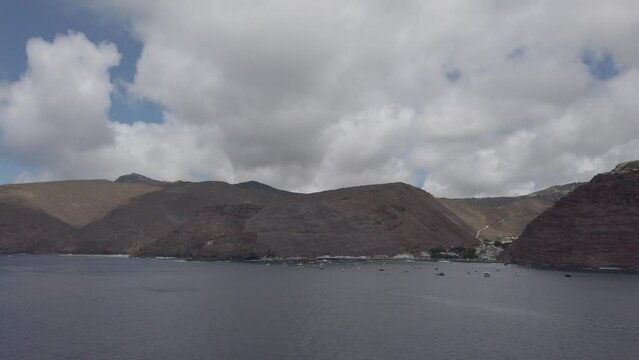Tristan da Cunha, Saint Helena Island. Rocky Coastline and Coastal Settlement in Jamestown. 