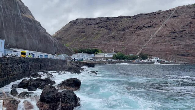 Tristan da Cunha, Saint Helena Island. Rocky Coastline and Coastal Settlement in Jamestown. 