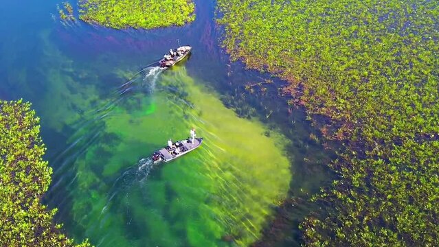 Two small boats take fishermen to the clear waters of the pantanal