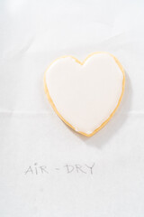 Heart-shaped sugar cookies with royal icing