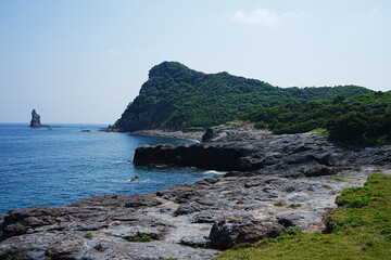 Fototapeta na wymiar Tategami-Iwa or Standing God Rock at Hinokami Park in Kagoshima, Japan - 日本 鹿児島 火之神公園 立神岩