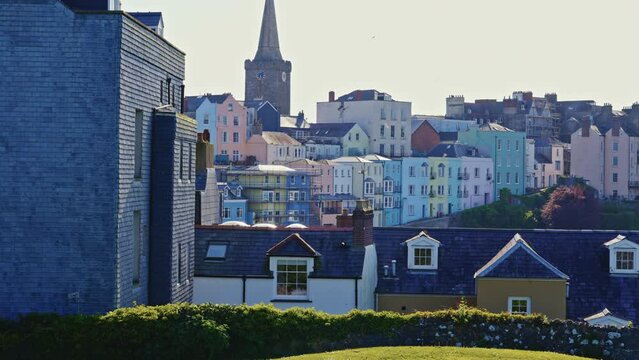The multi colored buildings of downtown Tenby Wales on an overcast day