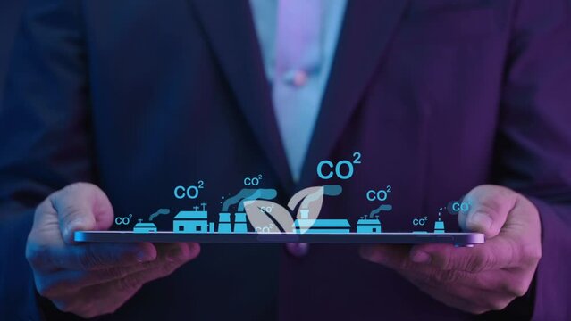 Businessman showing his tablet with ESG icon and virtual tree. Net zero greenhouse gas emissions target. Climate neutral long term strategy. Ecological, renewable energy and save environment concept.