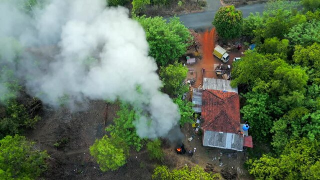greenery village smoke bird eye closeup to wide view in malvan