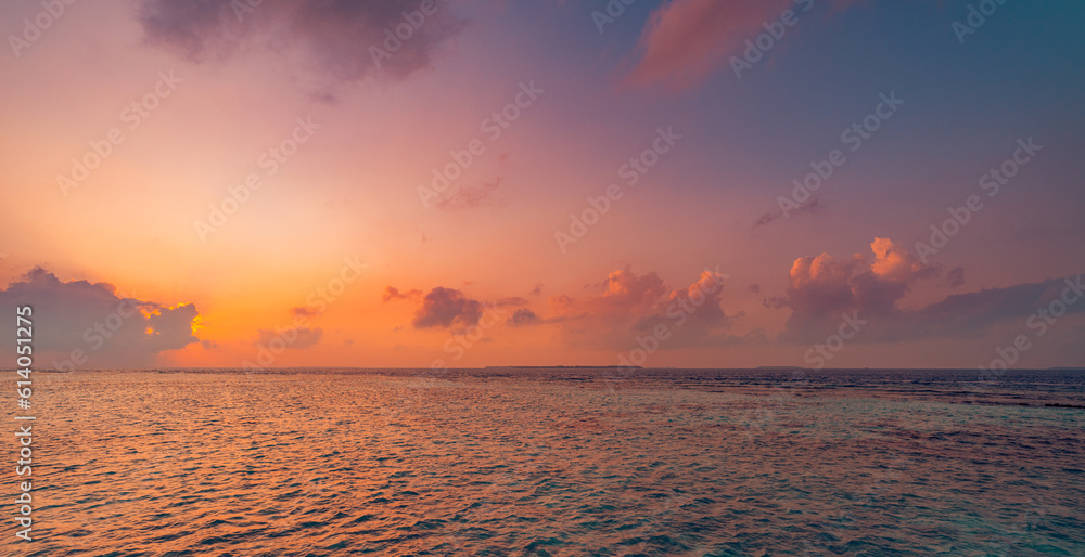 Wall mural sunset sky over sea horizon in evening. colorful clouds orange sunlight, dusk calm water bay sunrise - Wall murals