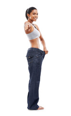 Portrait, woman and baggy jeans with hand pointing on isolated, transparent and png background. You, finger and female person with lose weight, exercise and healthy lifestyle, diet or motivation