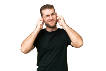 Young handsome blonde man over isolated chroma key background frustrated and covering ears