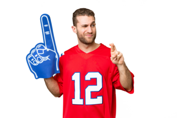 sports fan man over isolated chroma key background with fingers crossing and wishing the best